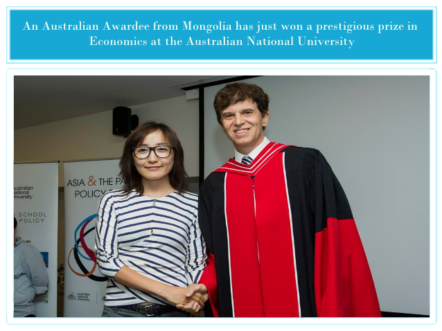 Ms. B. Tsendsuren shaking hands with Prof Tom Kompas, Director of Crawford School of Public Policy and Director of Australian Centre for biosecurity and Environmental Economics (ACBEE) after winning the Helen Hughes Graduate Diploma Prize, achieving the highest results among all other scholars studying Economics at the Crawford School of Public Policy of Australian National University.